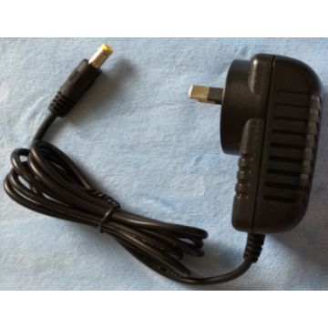 Adapter/strømforsyning til trådløs alarm modtager